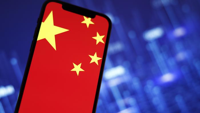 The Chinese flag is seen on a mobile phone in this photo illustration in Warsaw, Poland on 27 September, 2022. (Photo by STR/NurPhoto via Getty Images)