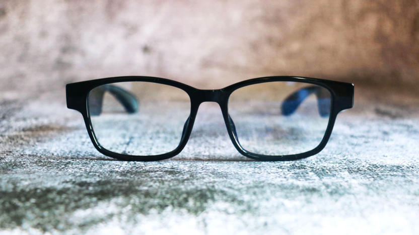 Razer Anzu smart glasses in black against a stone-patterned background.